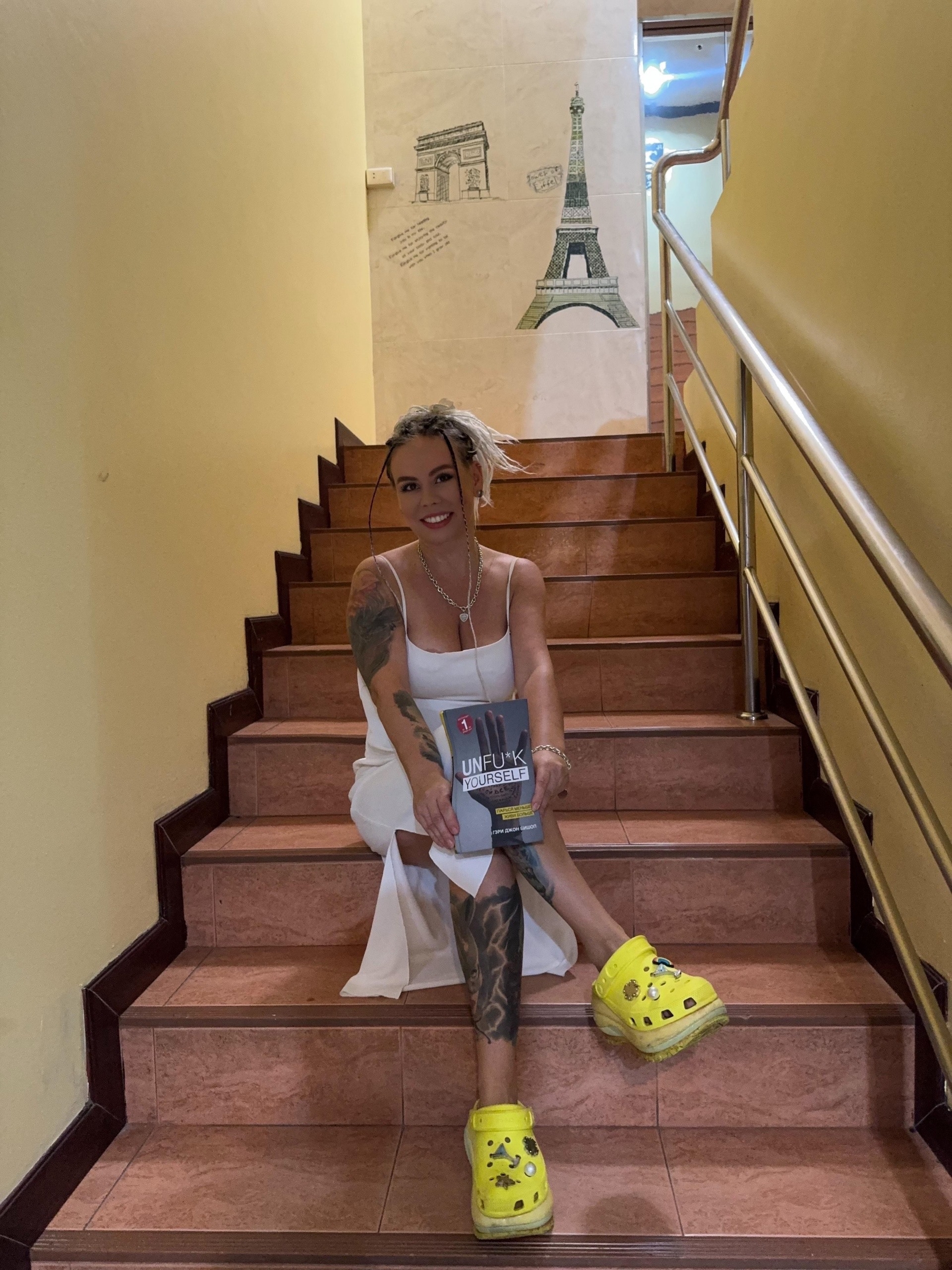 Maria Dyukova (Mariangel777) sitting on stairs indoors