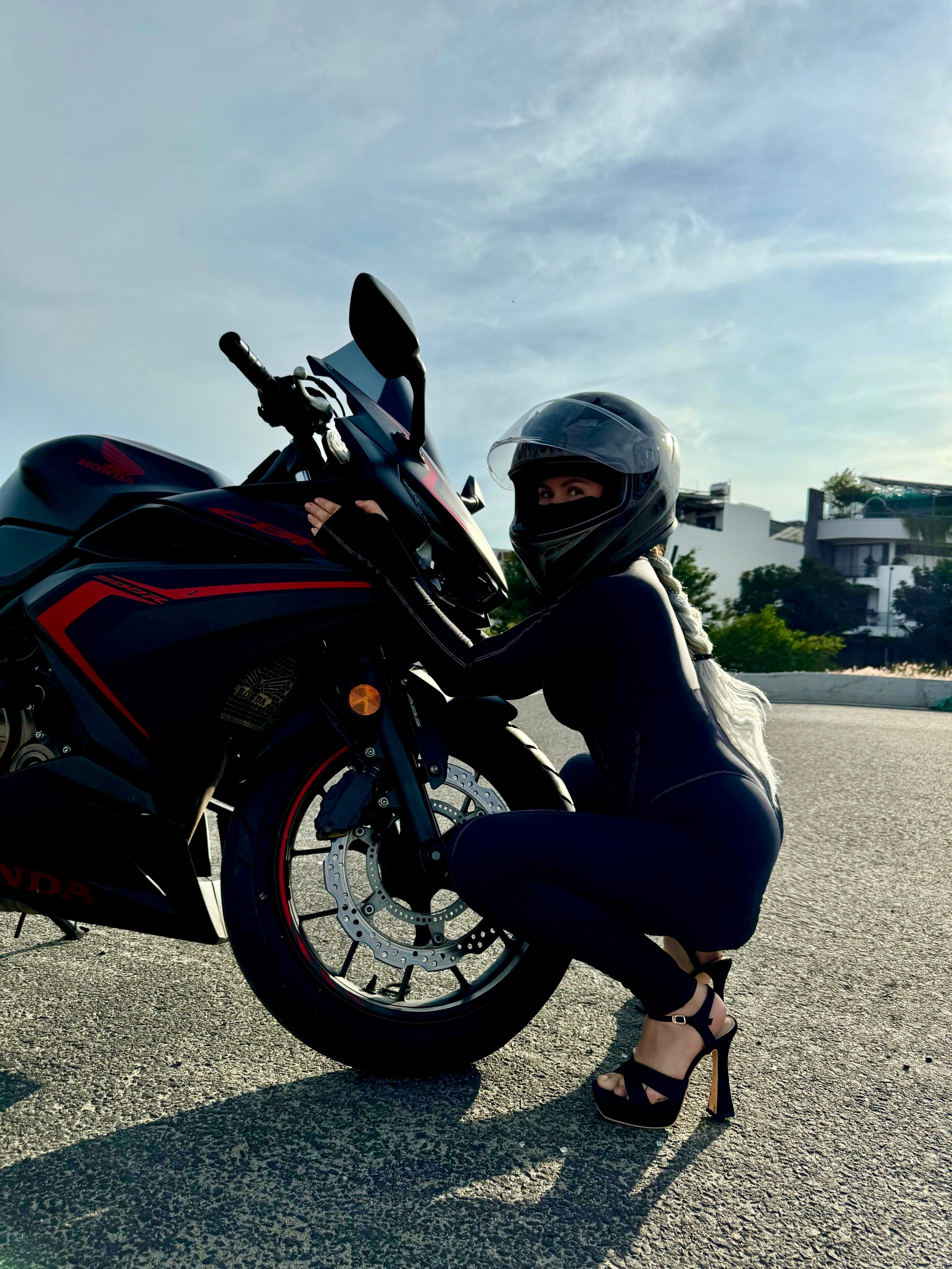 Maria Dyukova (Mariangel777) posing with a motorcycle